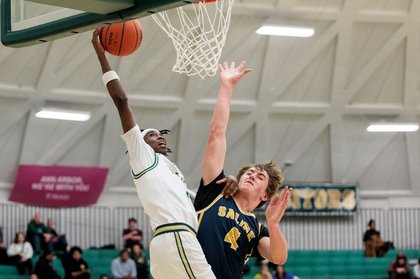 Our favorite photos from Ann Arbor Huron’s  70-51 win over Saline
