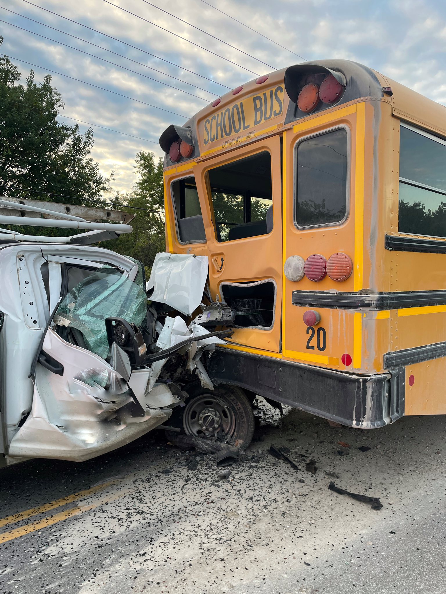 Work Truck Slams Into School Bus