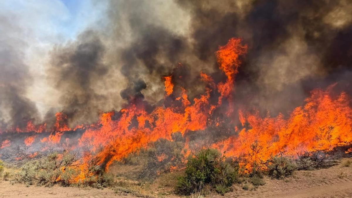 Crews unable to reach crashed helicopter in Utah fire