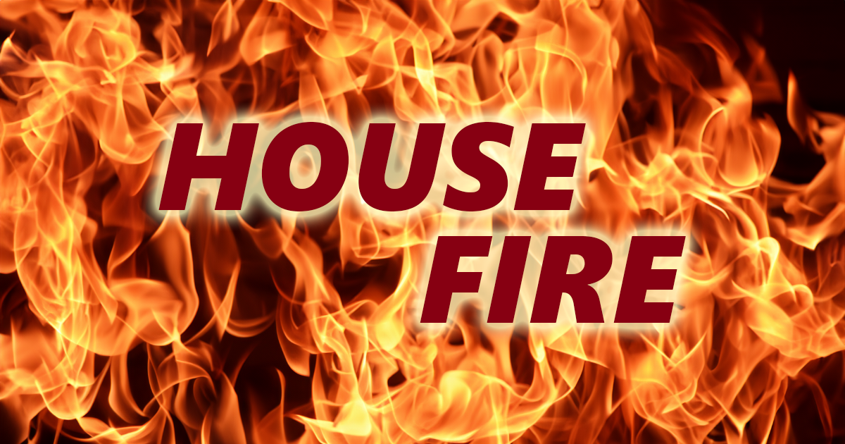 Emergency Personnel at Scene of Working House Fire in West Penn Township