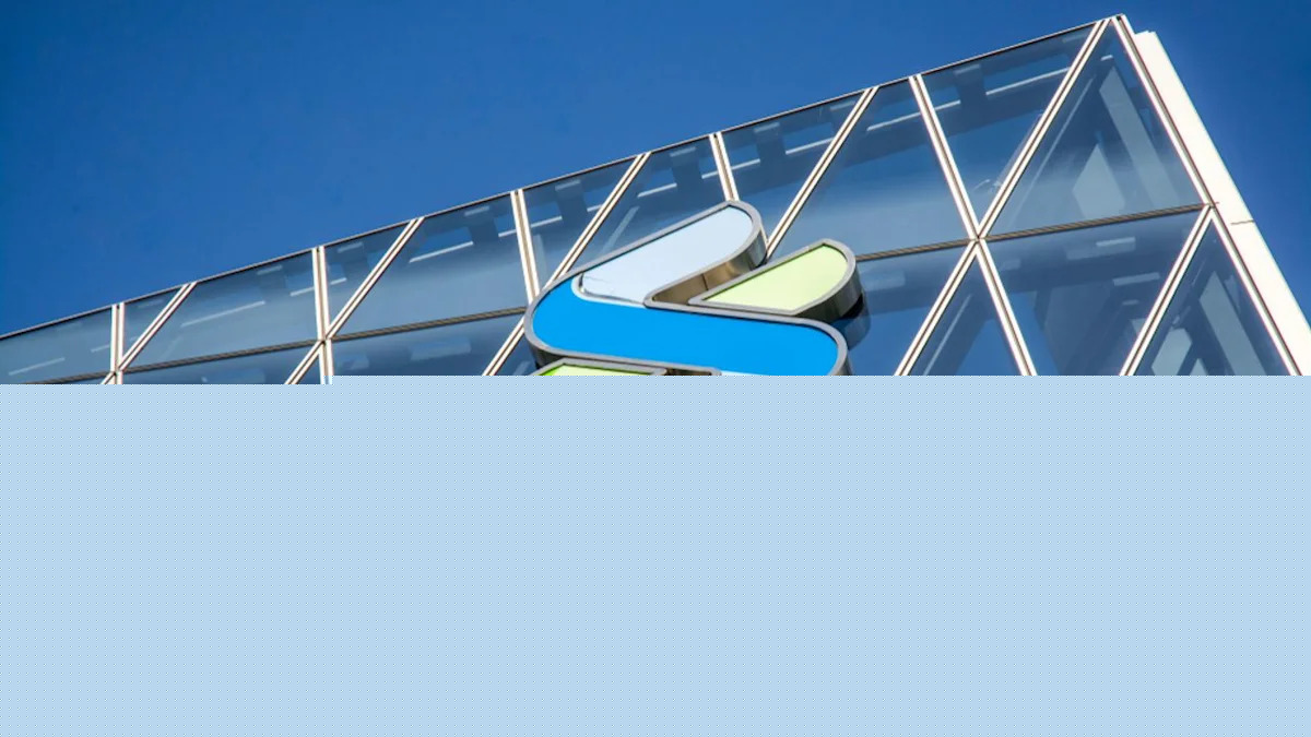 Standard Chartered rises as profit beats and guidance improves
