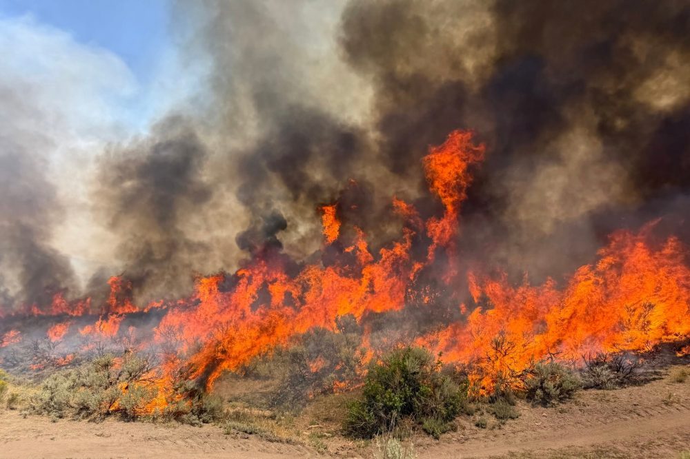 Dangerous wildfire keeps crews from reaching helicopter crash in Utah