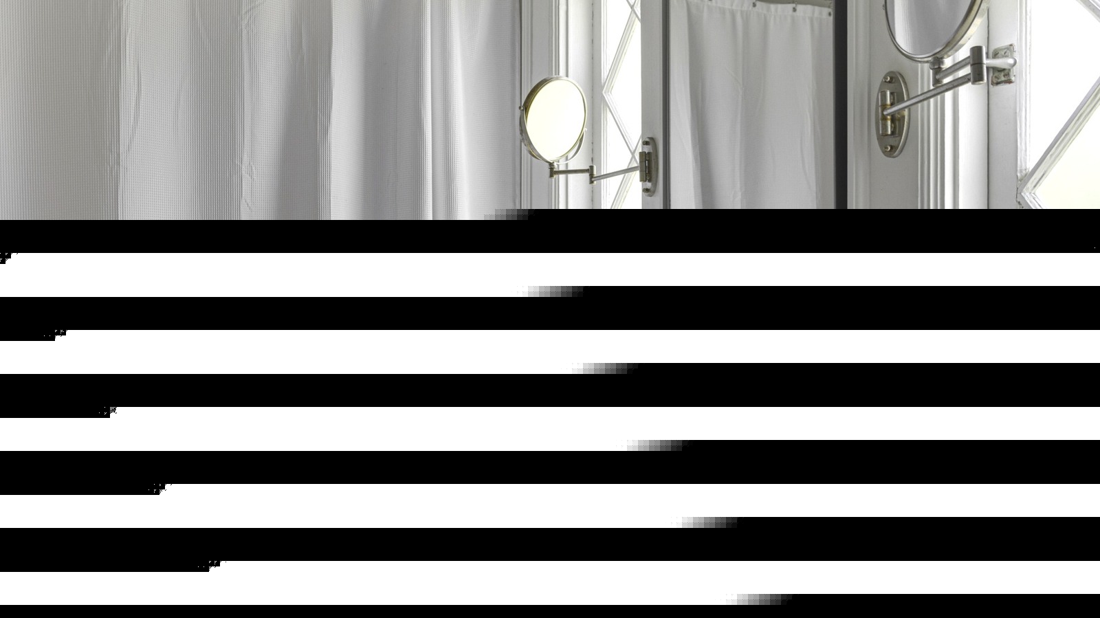 Skip The Bathtub Curtain: This Alternative Is So Much More Streamlined