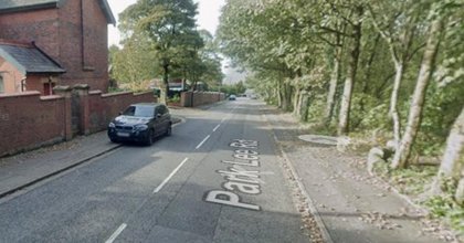 Emergency services descend after reports of 'car on its side' in Blackburn