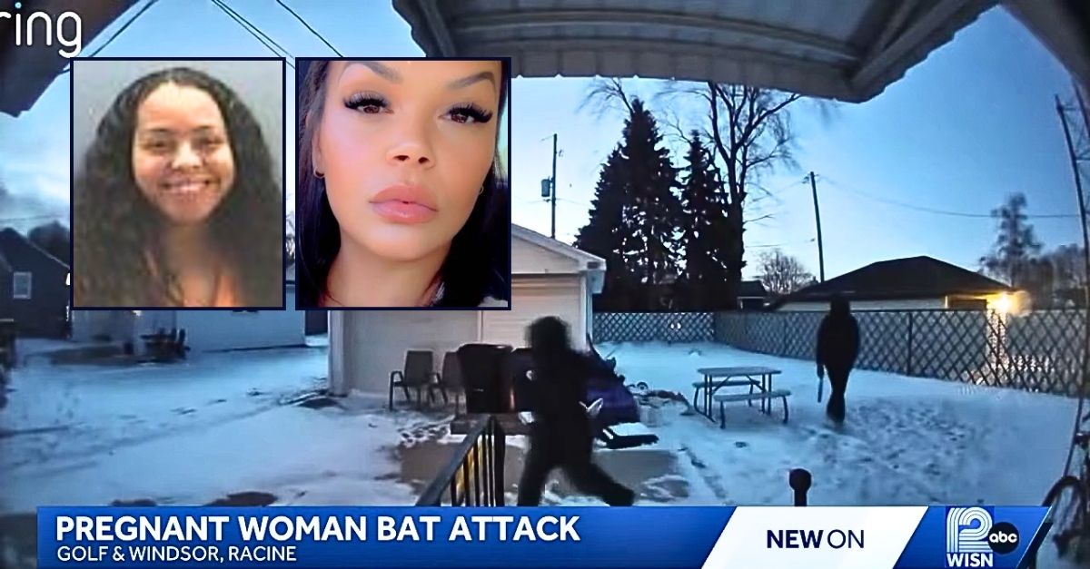 'Beat the baby out': Woman is all smiles after beating pregnant mother of 2 with baseball bat as she was heading out to warm up car, cops say