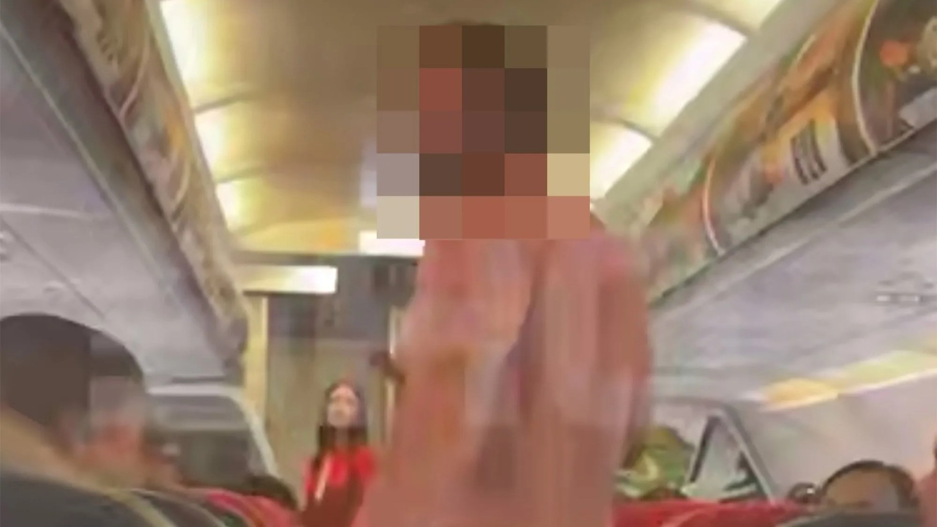 Horror moment passenger strips & threatens to leap from plane while yelling ‘do they want us to die?’ in mid-air terror