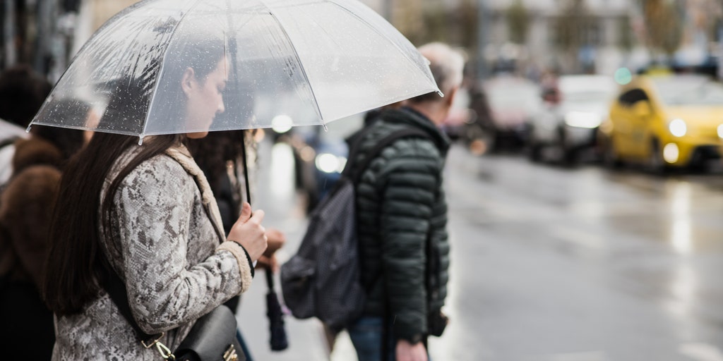 East Coast faces double threat of flash flooding in the North and tropical downpours in the South