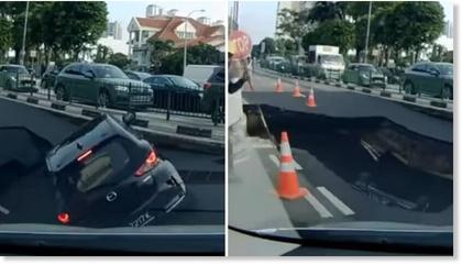 Car falls into sinkhole in Singapore