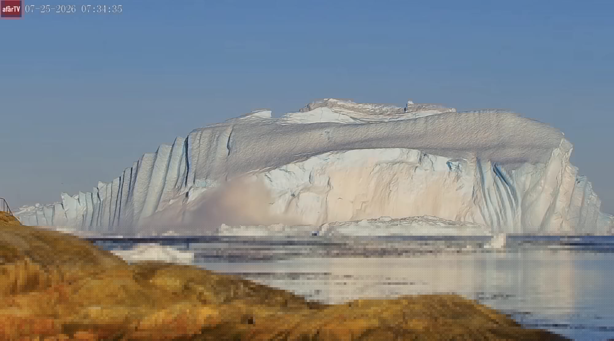 Video: Watch a Monumental Iceberg in Greenland Do a Somersault [10:19]
