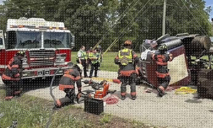 Truck overturns, driver airlifted after extrication