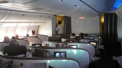 ‘I’m sorry when did it become my responsibility?’: Passenger settles into luxurious $7,000 business class seat when mom makes bold request