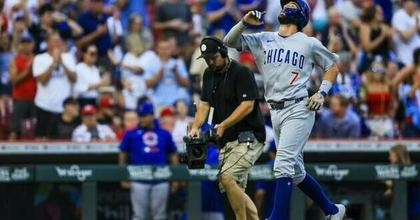 Reds sock five homers to dump Cubs, keep heat on Mets