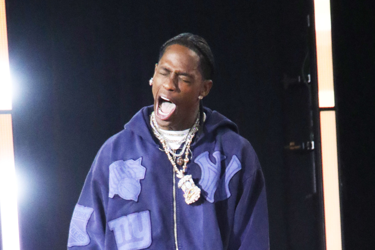 Travis Scott Commits “Food Crime” By Eating KFC With A Fork, Fast Food Chain Weighs In