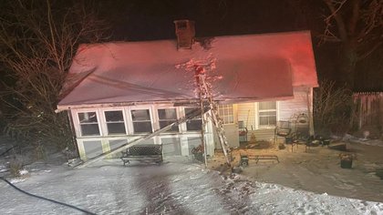 Units respond to fire in Warren County, rescue homeowner from roof