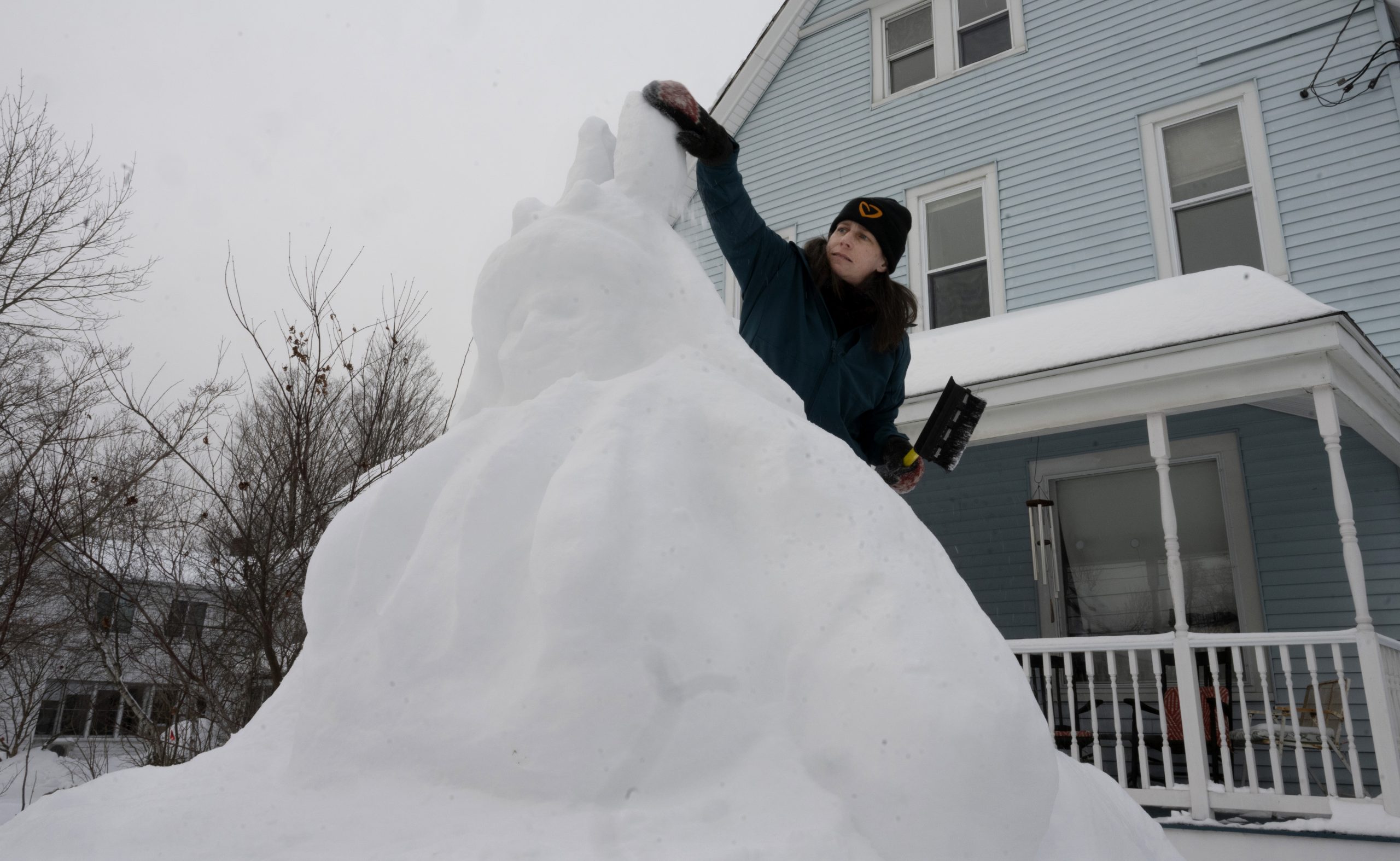 Photo: Whimsical Bunny Boy: Snow sculpture reflects immigrant child’s image