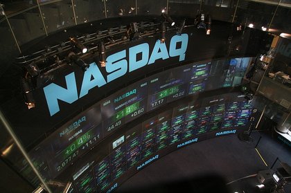 U.S. Stock Futures Edge Lower as Tech Earnings and Fed Decision Shape Market Sentiment
