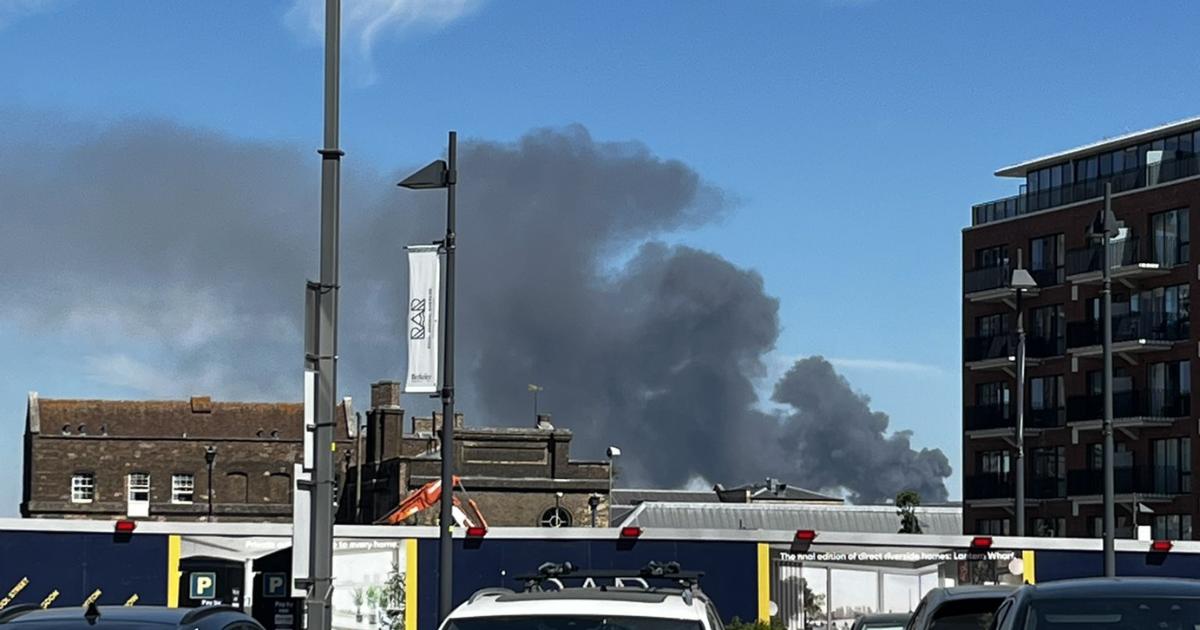 LIVE as thick smoke rises over A13 as 100 firefighters tackle blaze