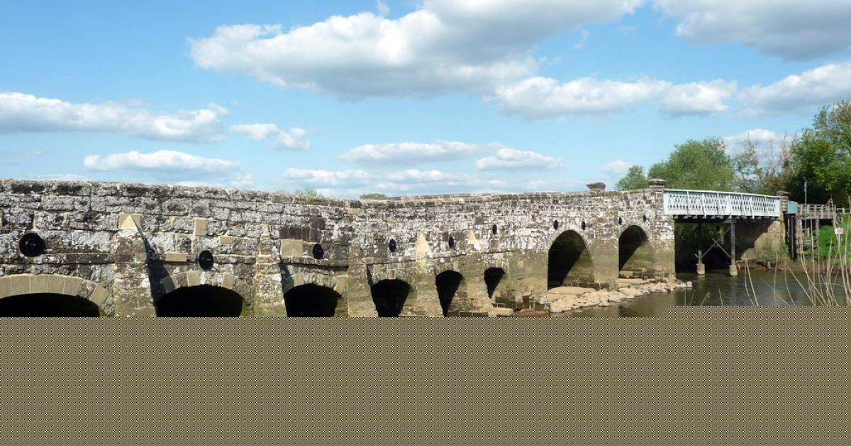 Historic bridge closed 'until further notice' after crash and fire