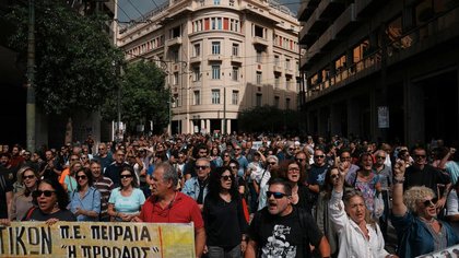 Greek ferries, trains halted as thousands protest
