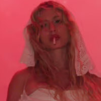 Slayyyter Releases New Single brand new chanel$