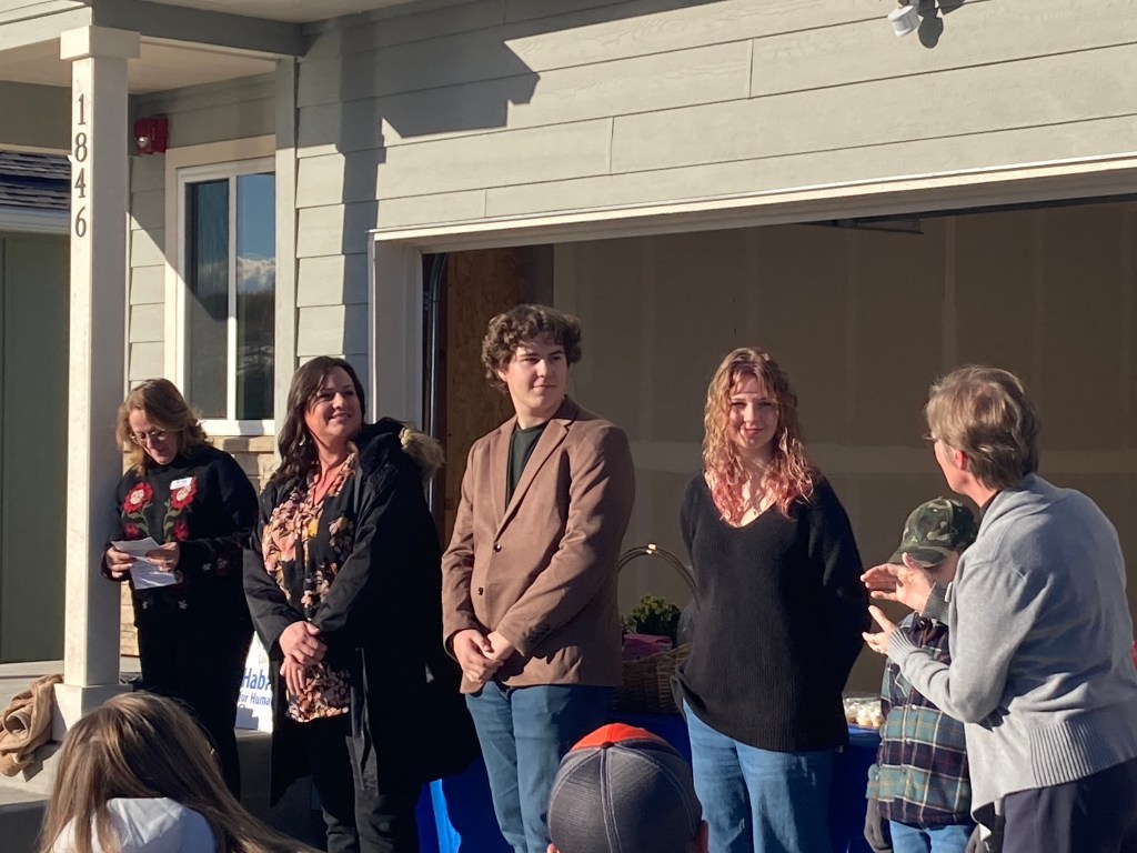 Single mother of three receives new Habitat for Humanity home