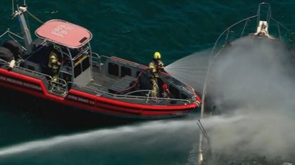 Man’s lucky escape as boat catches fire, sinks