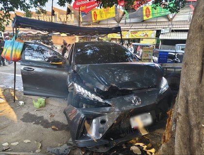Grab Car Crashes in Chiang Mai Injuring Spanish Tourist and Roadside Vendor