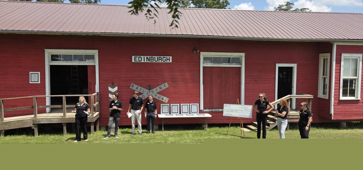 Ohnward Bank interns help preserve Jones County history through Pioneer Village partnership