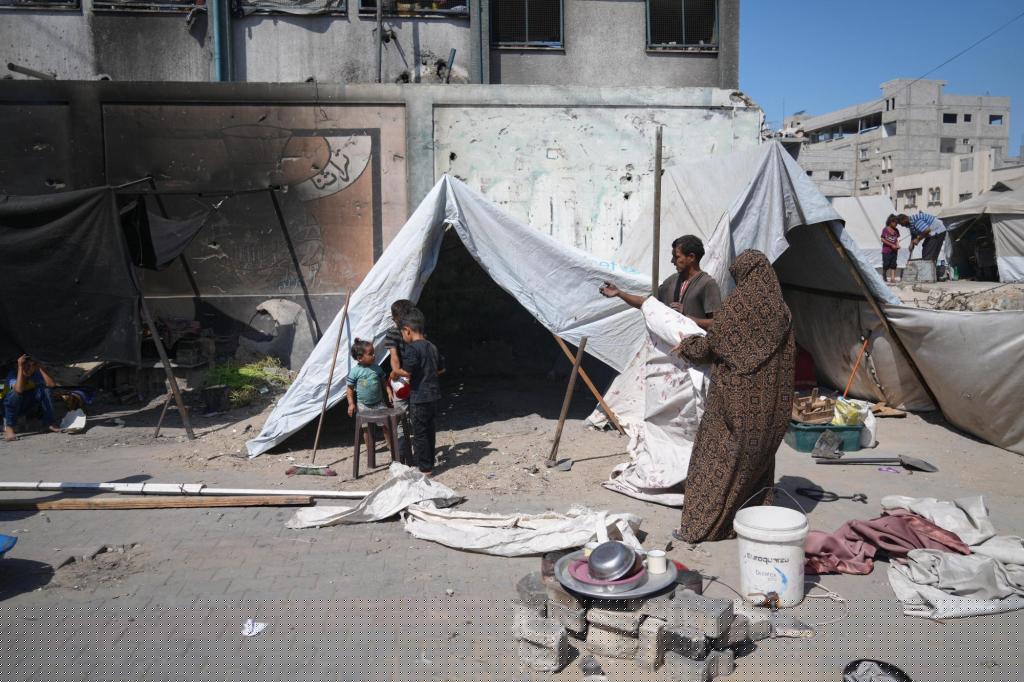 Israeli troops kill at least 31 Palestinians in Gaza as Trump peace proposal raises questions