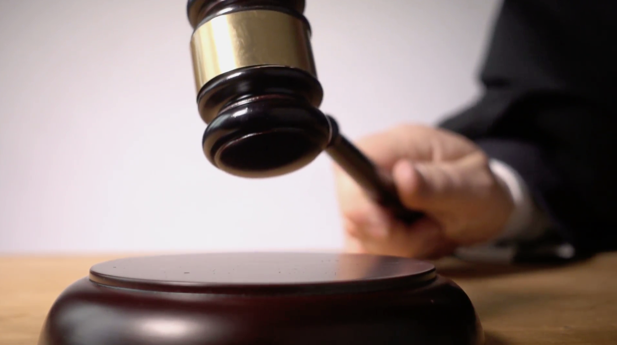 Mother of man who killed Sheridan policeman sentenced to prison