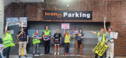 Neighbors and activists protest suspected ICE parking on Harrison