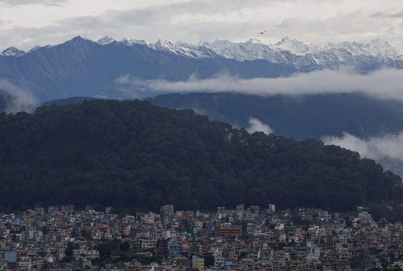 Heavy rains kill at least 22 in Nepal, block roads