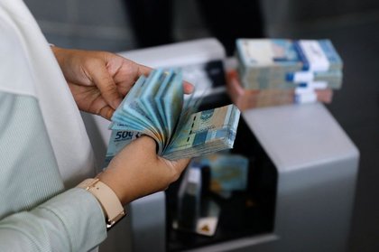 Indonesian authorities attempt to soothe worries after $80 billion market rout