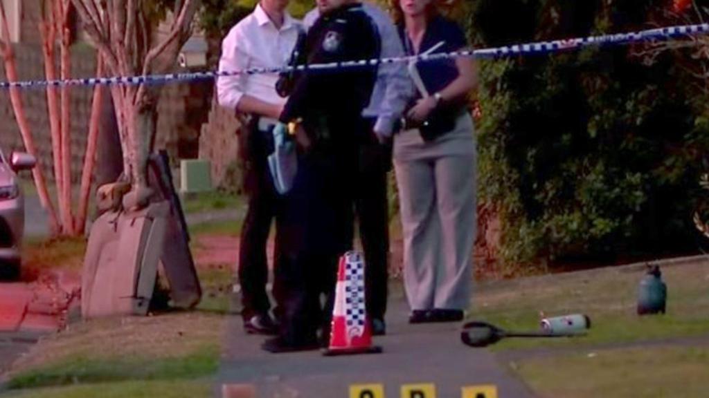 Manhunt for trio seen fleeing horror southwest Brisbane brawl in white Audi, man left fighting for life after stabbing