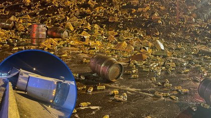 Rollover crash of semi truck covers I-70 in beer