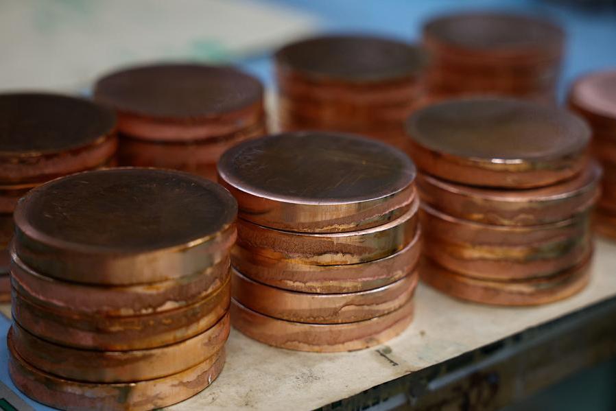 Copper hits record high above $14,000 as speculators pile in