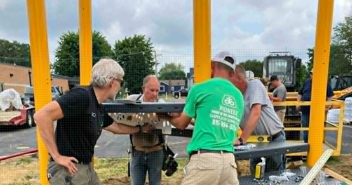 Polo Lions Club helps to install playground equipment