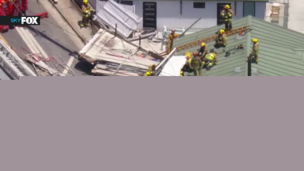 Truck driver rescued after crashing into building on PCH