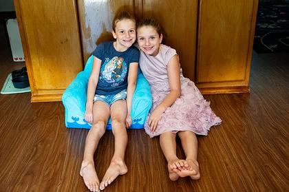 Sisters join hundreds of local kids raising money through Lemonade Day