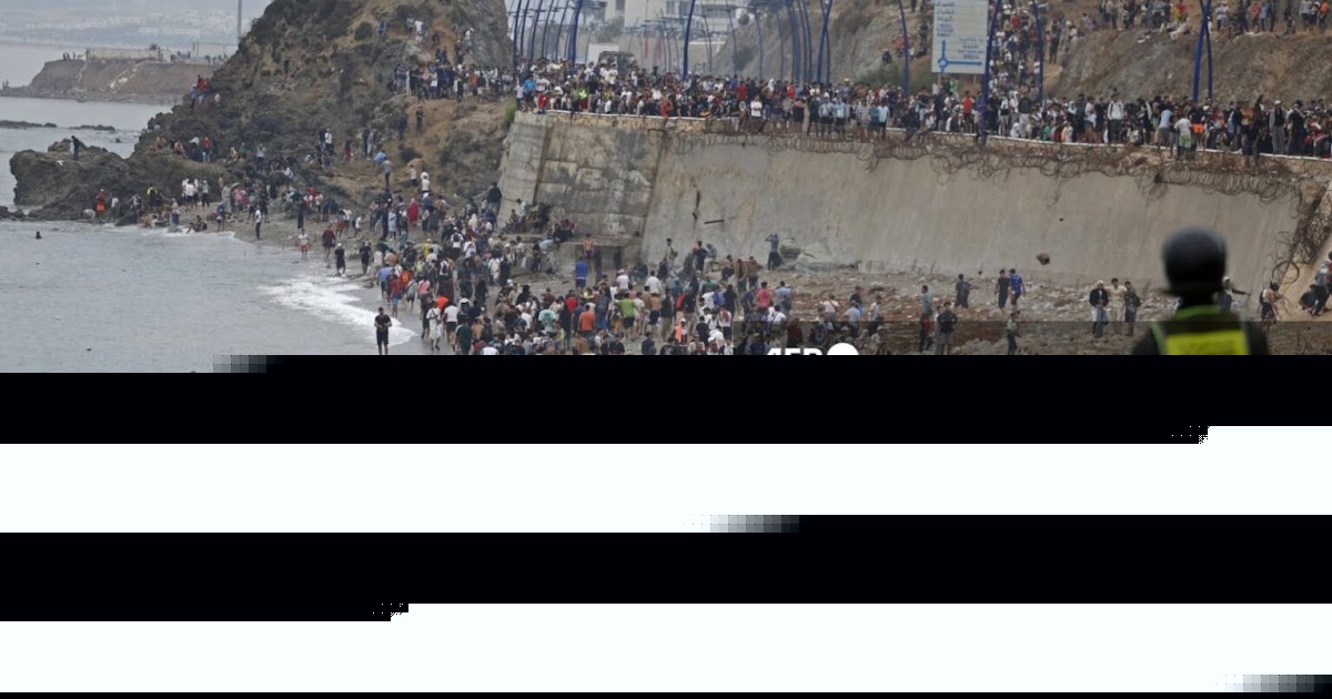 Morocco says 11 died in Ceuta crossing after Spain puts toll at 72