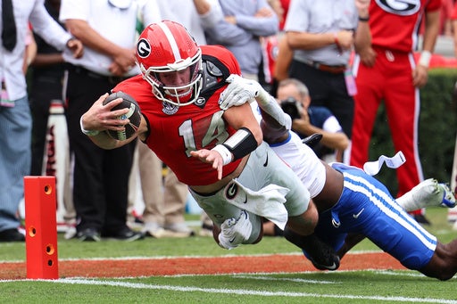 No. 12 Georgia bounces back from first loss of the season to beat Kentucky 35-14