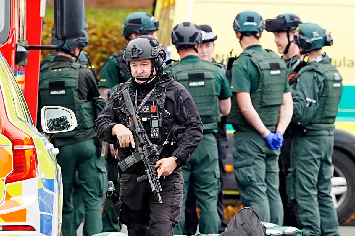 Four injured after car driven at people and man stabbed outside synagogue