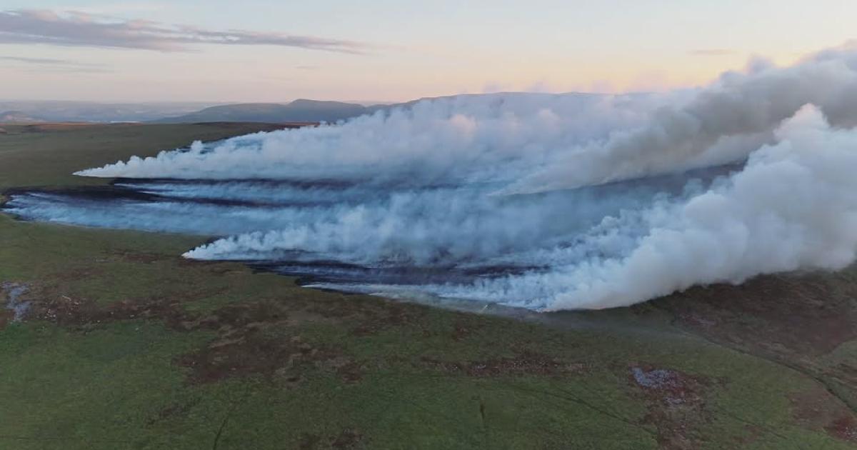 Wildfire expected to burn for days as firefighting helicopter joins crews