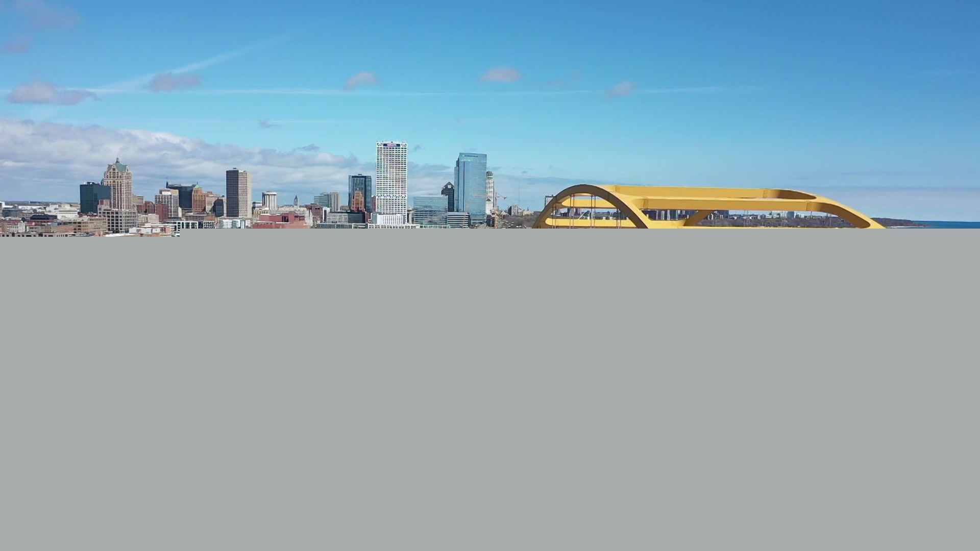 DOJ sues Milwaukee over law banning masks for federal officers