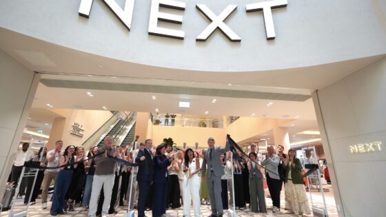 Next beats forecast, raises guidance