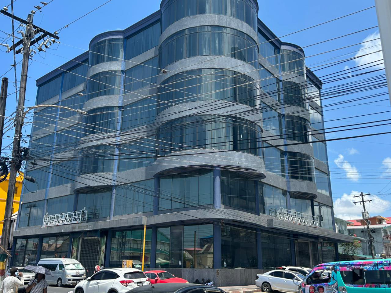 Towering buildings opposite each other on Camp St for rent