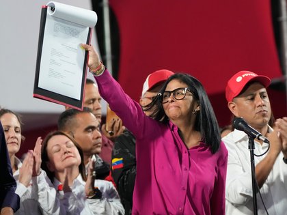 Venezuela’s Rodriguez signs oil reform law while the US eases sanctions