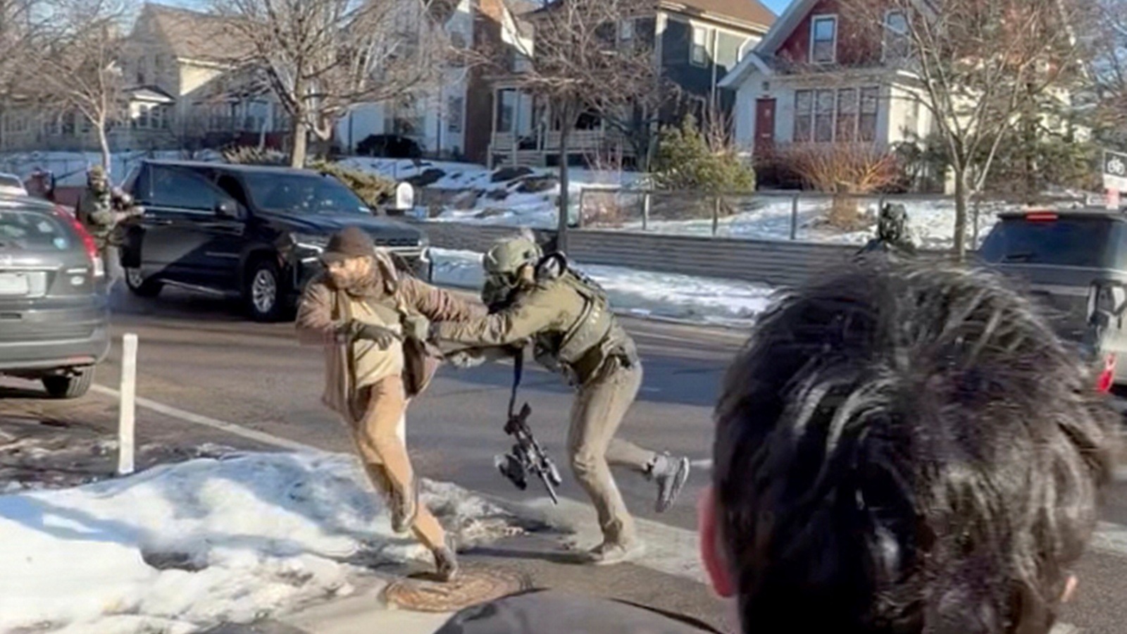 Videos show scuffle between Alex Pretti and federal officers in Minneapolis 11 days before killing