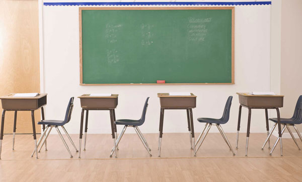 Families struggling with back-to-school costs, TDs say