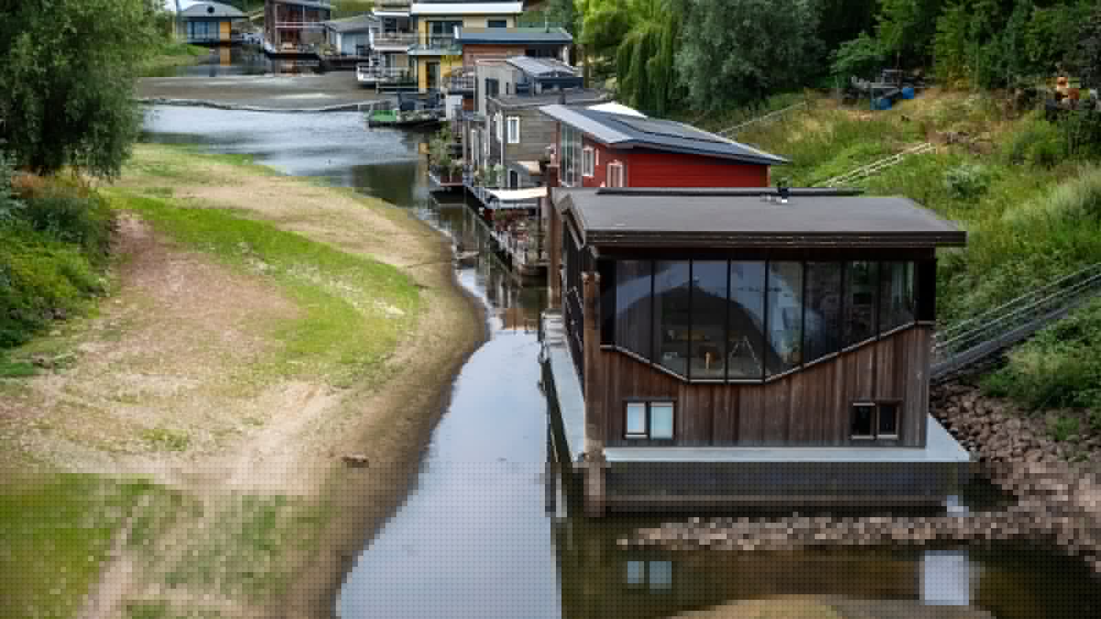 Dry, hot summers are putting Dutch dikes at risk and threatening German river trade